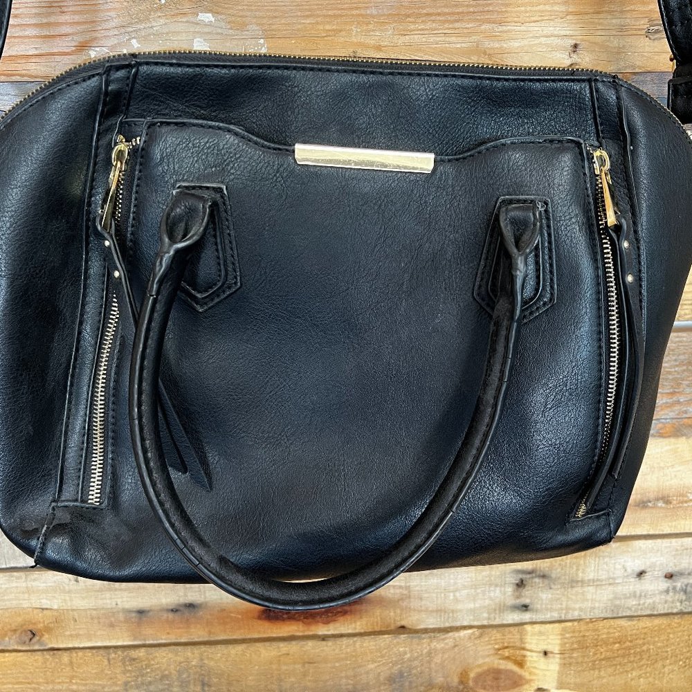 Womens Mossimo black handbag with gold hardware.